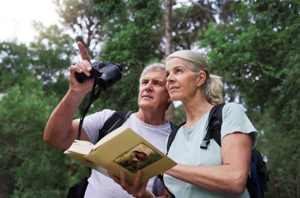 Couple birdwatching on the Great Florida Birding Trail.